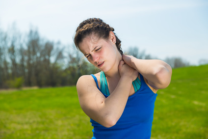 Woman with pain in shoulder